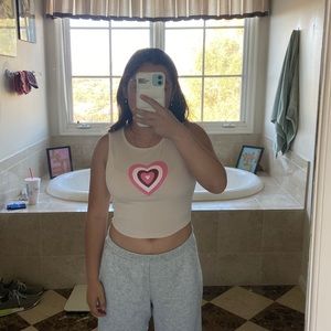 beige tank top with pink heart